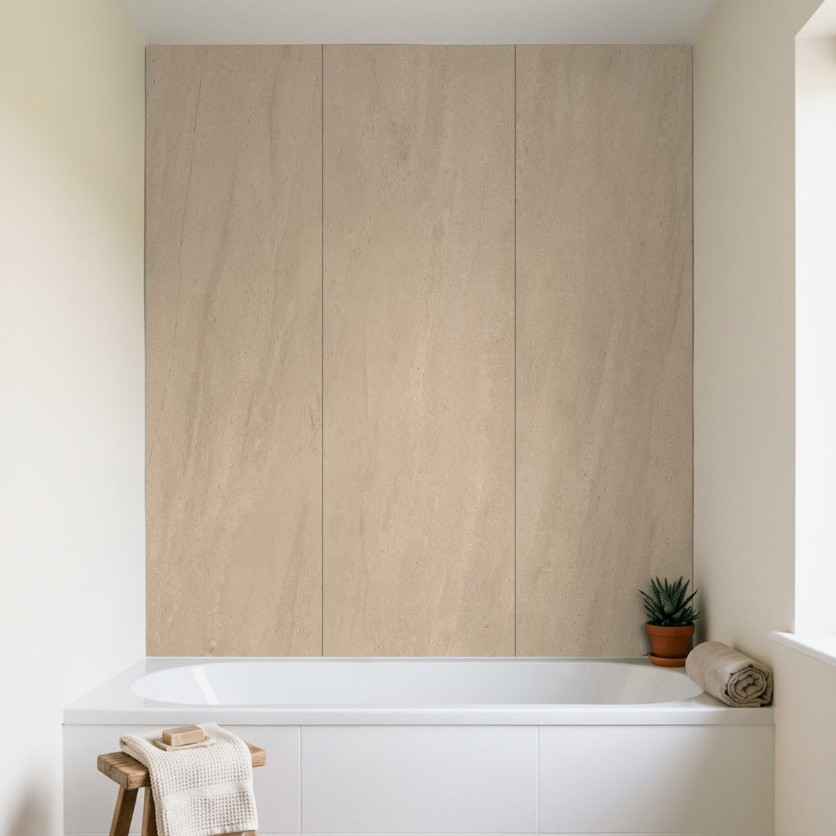 Beige stone-effect Rapid Stone wall panels above a bath